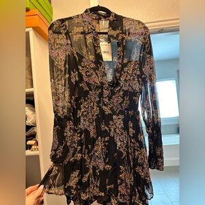 NWT Free people dress size xs perfect for fall! Never been worn